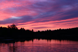 Photograph by Cliff Homewood, Red Sky at Night
